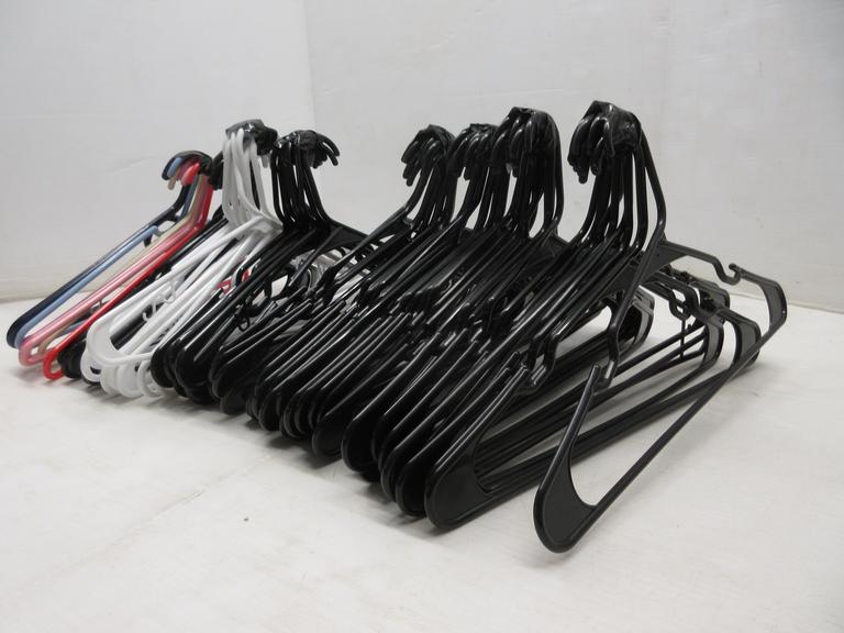 (65) Plastic Black Hangers, (11) Plastic White Hangers, (7) Multi-Colored Plastic Hangers, (4) Black Felt Hangers, and a Wood Pant HangerCondition:Used