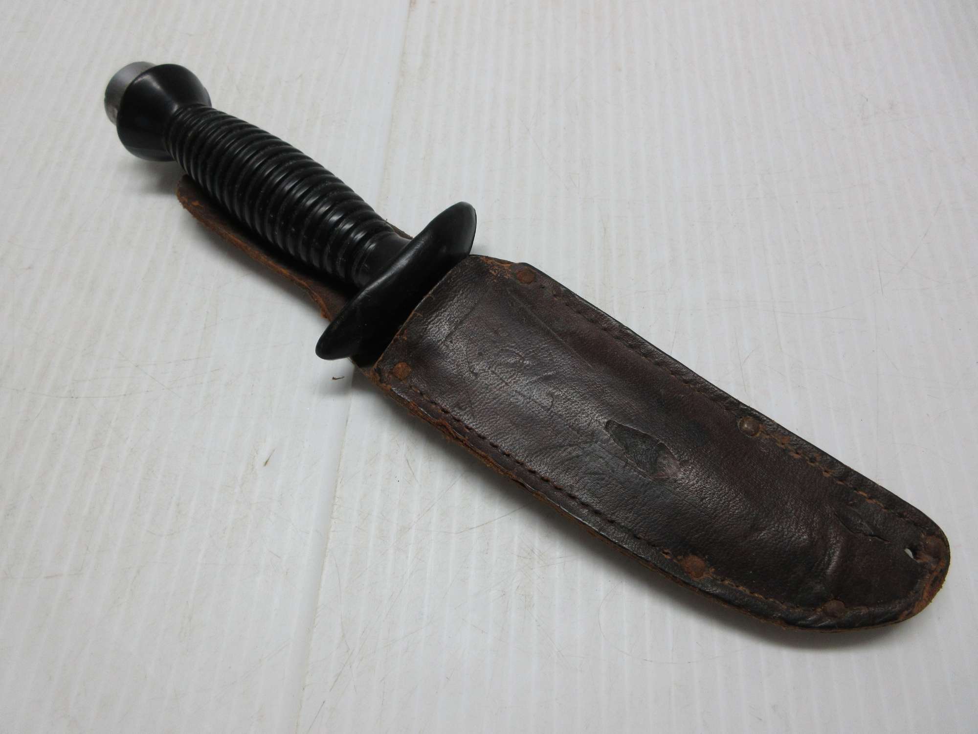 Albrecht Auctions Antique Military Boot Knife and Black Leather Sheath