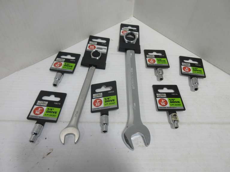 (6) Various Sized 1/4" Drive Sockets and (2) Wrenches: 14mm and 19mm