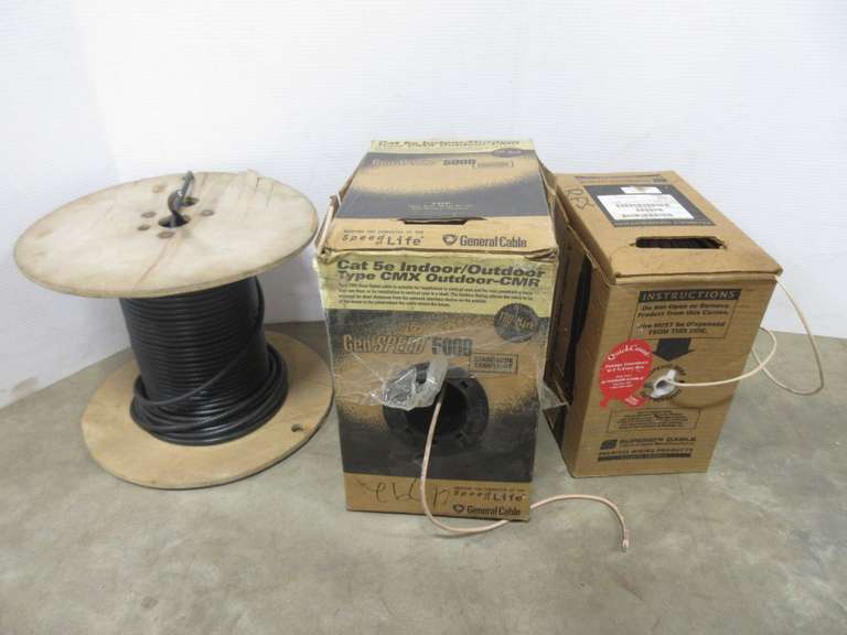 Spool of Cat 5e Cable, Spool of Telephone Wire, and a Spool of Coaxial Cable