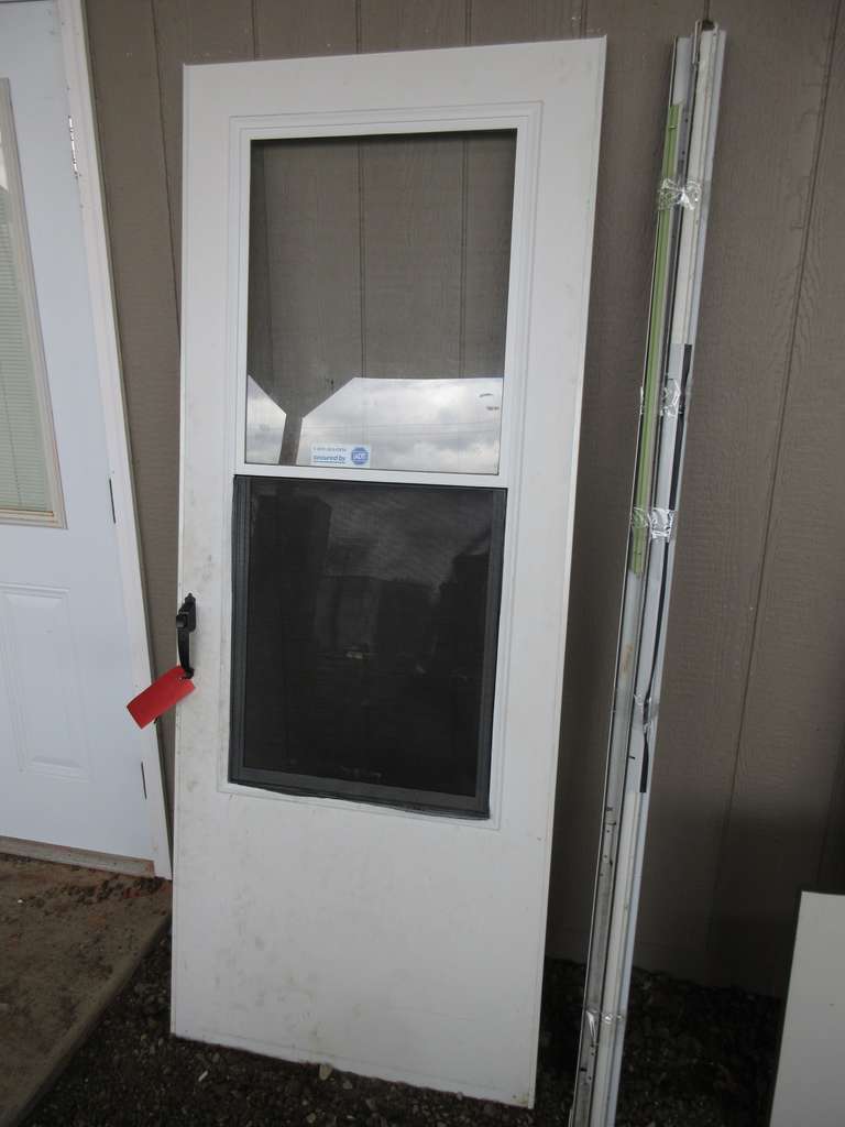 Screen/Storm Door, White in Color, Also Comes with All Trim Pieces