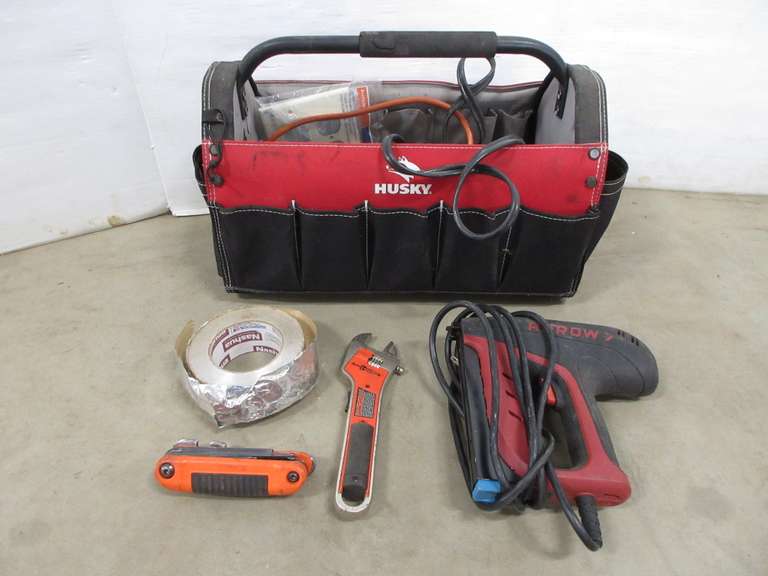 Husky Tool Bag Filled with a Wide Assortment of Hand Tools and Electric Staple Gun