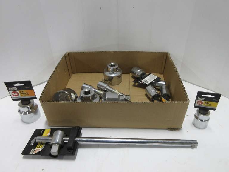 Various 3/4" Drive Sockets, (3) 3/4" Drive Extensions, and a 3/4" Drive Slide Handle Breaker Bar