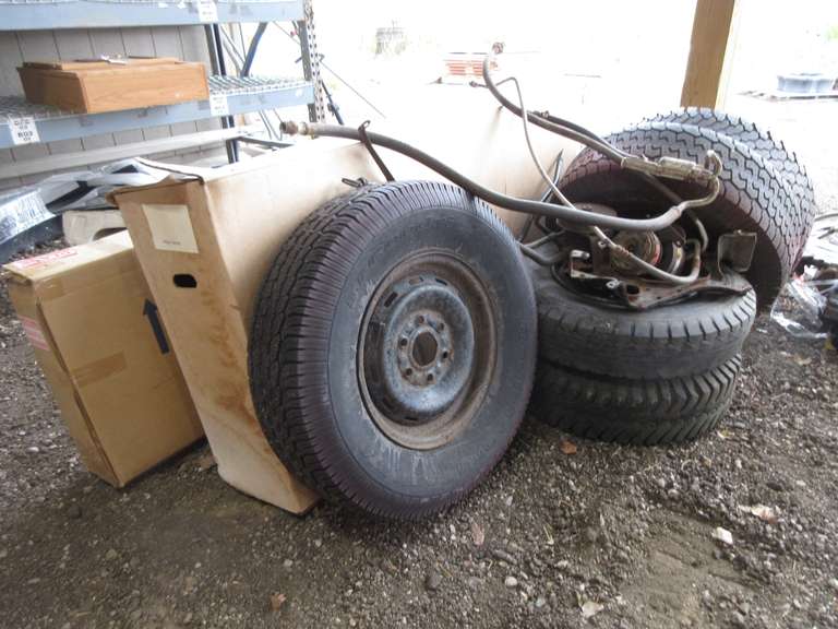 (5) Truck 16" Rims: 2- Eight-Lug, This Item is Selling for the Rims.  There are No Returns for Tires.; (2) Early 1960s Chevy Impala Windshields, Original, Unbroken; Small Lot of 1980s Chevy Truck Parts, Power Steering Pump and (2) AC Compressors