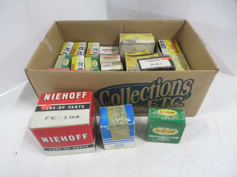 Older Auto Parts, Include: (6) Radiator Caps, (5) Thermostats, (7) Gas Caps, EGR Valve, Wheel Cylinder, Electric Control Unit, Starter Drive, and (2) Automatic Vacuum Modulator