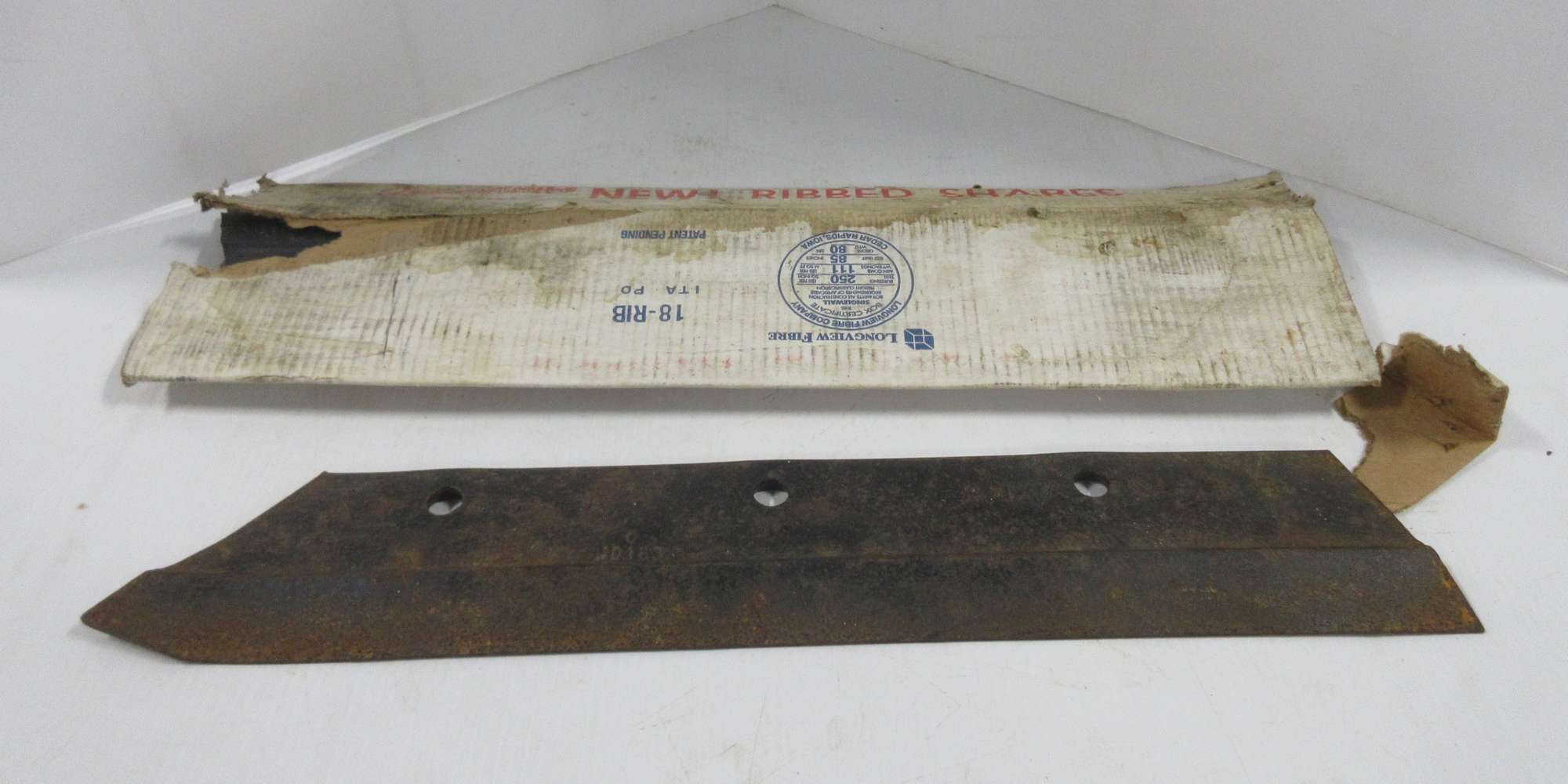 Albrecht Auctions (3) Osmundson Plow Shares and an Adams Plow Share
