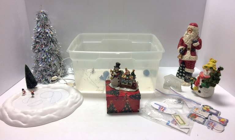 Tote Filled with Christmas Decorations, Include: Ice Skate Pond with Moving Skaters, Santa, Snowman, Tree, and More