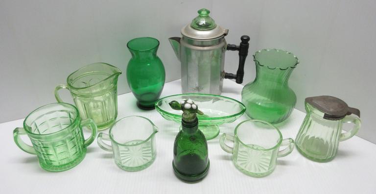 Green Depression Glass Items, Include: Creamer and Sugar, Coffee Pot with Green Glass Top, Syrup Holder with a Tin Lid, Vase, Oval Bowl, Vase, Bottle with Turtle Stopper, Sugar Dish, and a Creamer