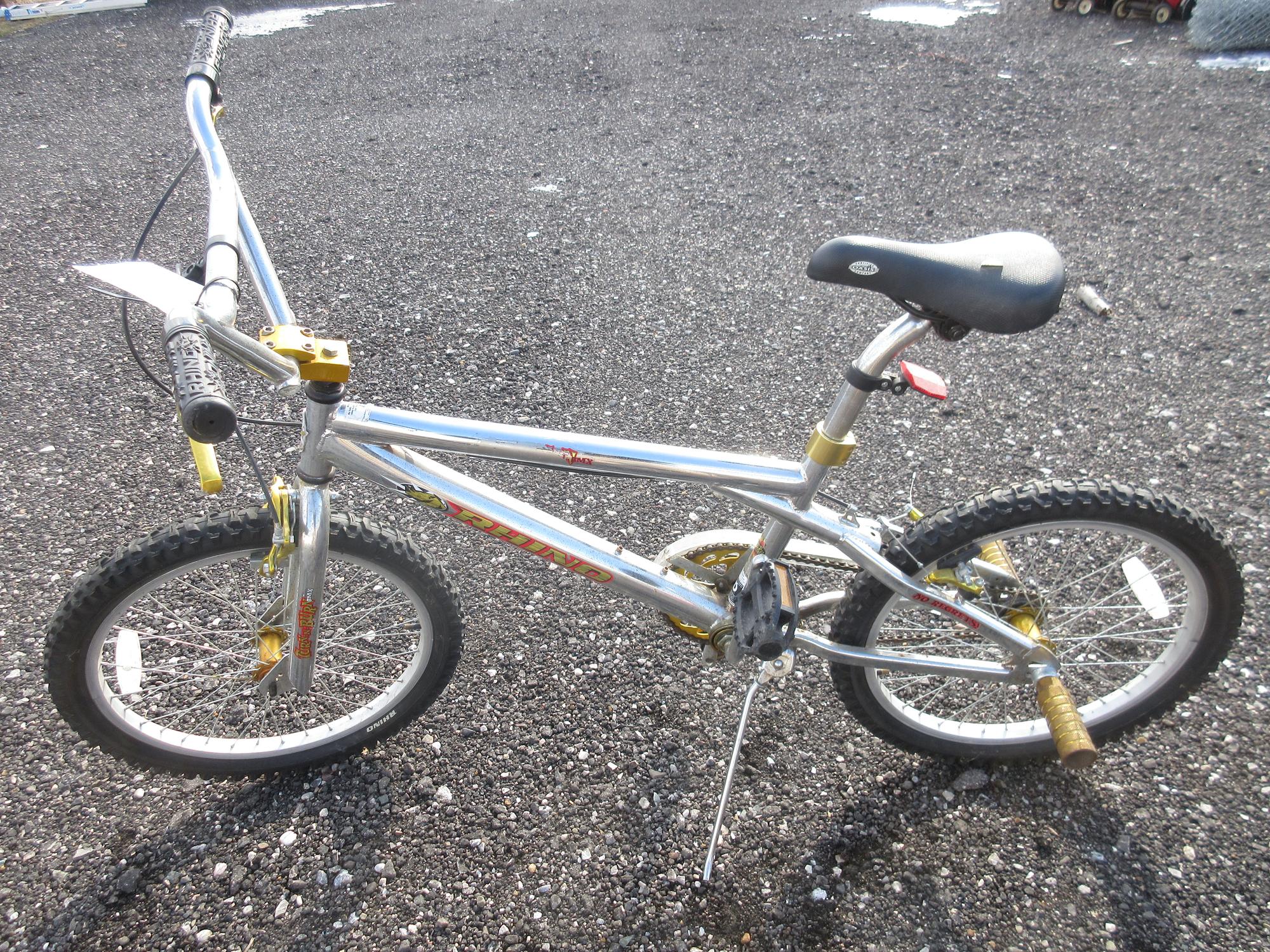 Albrecht Auctions | Boys 16" BMX Rhino Bike with Stunt Pegs