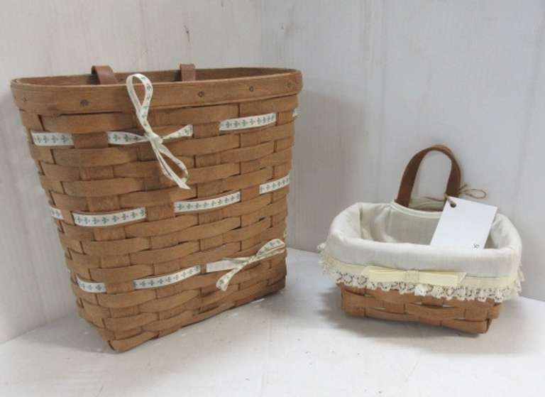 Set of (2) Older Longaberger Baskets, Made in USA, Hand Woven Hard Maple, Dated 1986, Signed by Weaver, Include: 1- Small Key Basket with Cloth Liner, Leather Handle, Sawtooth Hanger on Back, 3 1/2"H; 1- Tall Key Basket, Leather Handle, Sawtooth Hanger on Back, 9"H