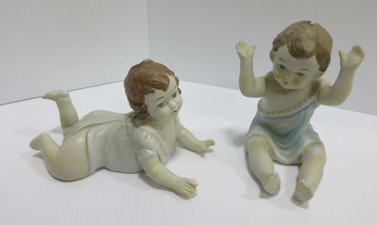 Antique Porcelain Piano Babies