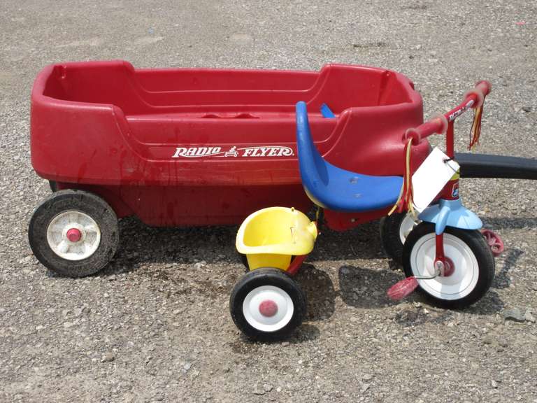 Radio Flyer Plastic Wagon with Two Storage Compartments and Radio Flyer Tricycle