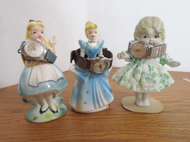 (2) 1960 Disney Cinderella Figurines, Timex Cinderella Watch, Mickey Mouse Watch, and Bisque Doll with Cloth Body