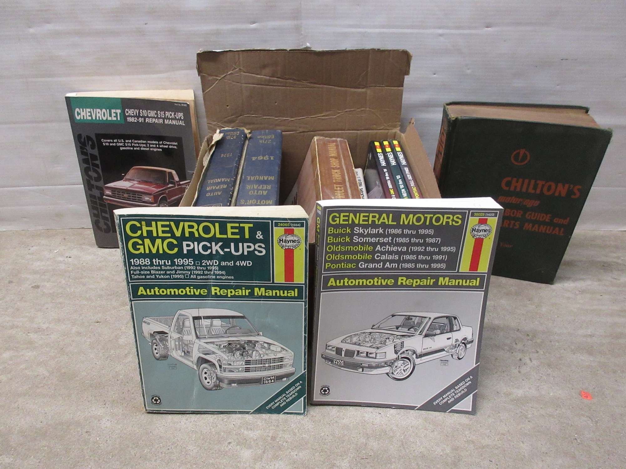 Albrecht Auctions (11) Auto Repair Manuals 1 Chiltons Labor Guide and Parts Manual; 1 Motor