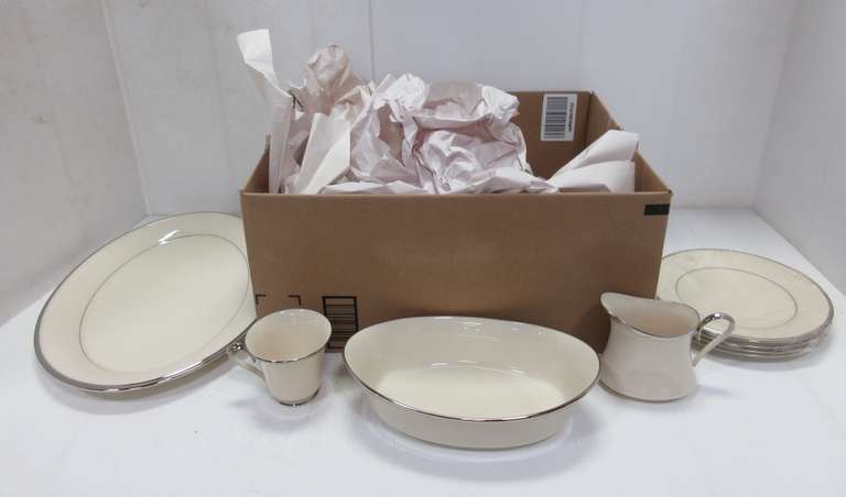 Lenox Solitaire Creamer and Sugar Bowl, (8) Salad Plates, (7) Mugs, Serving Platter, (8) Saucers, (8) Dessert Plates, (5) Dinner Plates, and a Serving Bowl