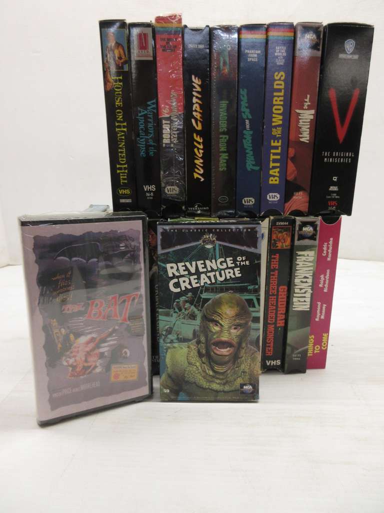 (22) Sci-Fi and Horror or VHS Movies, Include: Ghidorah the Three Headed Monster, Class of Nuke 'Em High 2, Invaders from Mars, Revenge of the Creature, The Bat, Little of Shop of Horrors, Barbella, Frankenstein, Warriors of the Apocalypse and Other Titles