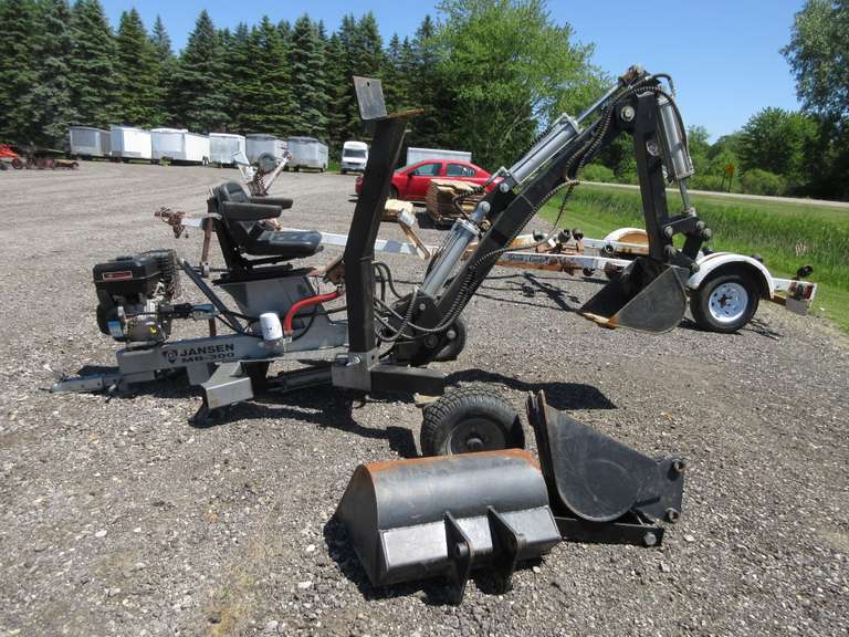 Jansen Towable Backhoe, Two Years Old, (3) Buckets and Thumb, 10 HP, 1,800 lb. Lift, 130° Swing, Pull Start Motor