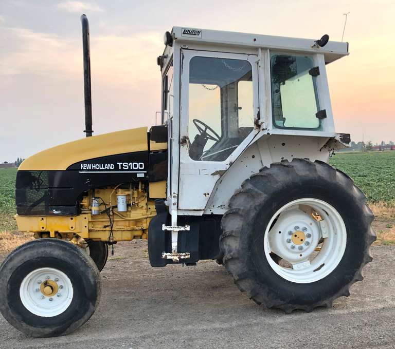 New Holland TS100 Tractor, (9800 Hours), Good Tires, Runs Well, Works as it Should, Needs Seat