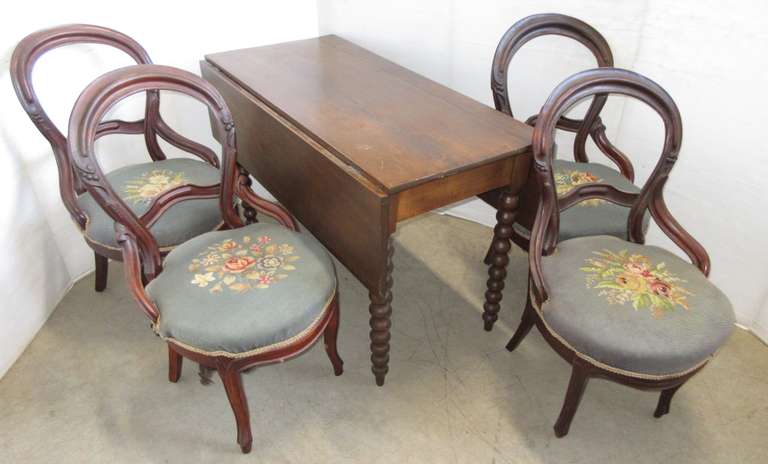 Heavy Dining Room Drop Leaf Table, Believed to be Hard Pine, Also Includes (4) Victorian Chairs with Needlepoint Seats