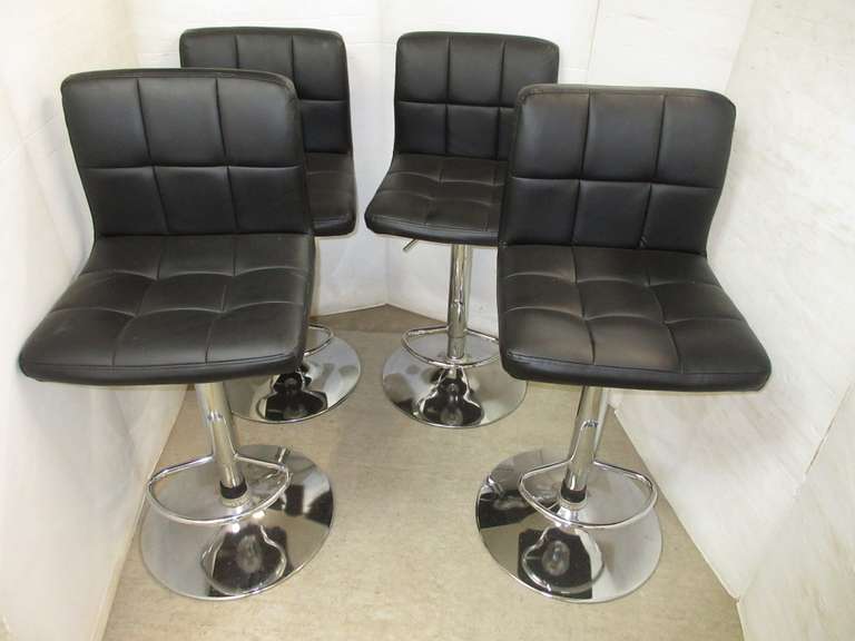 Set of (4) Black Leather and Chrome Based Adjustable Height Bar/Snack Stools