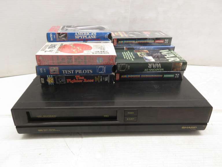 Sharp VHS/DVD Player with (12) VHS Tapes