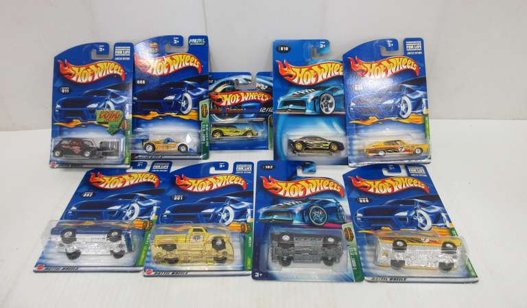 Hot Wheels Treasure Hunts Cars, Includes: 2002 No. 11 Mini Cooper, 2002 No. 2 71 Plymouth GTX, 2003 No. 8 Riley and Scott MK 111, 2003 No. 10 Muscle Tone, 2004 No. 2 GT-03, 2005 No. 12 Double Demon, 2001 No. 8 Dodge Charger, 2002 No. 1 La Troca, and 2001 No. 8 Dodge Charger