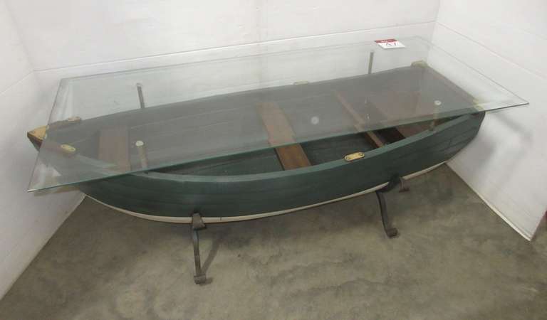 Wood Row Boat Coffee Table with Tempered Glass Sitting on a Heavy Metal Base with Brass Decorations, Glass is Beveled