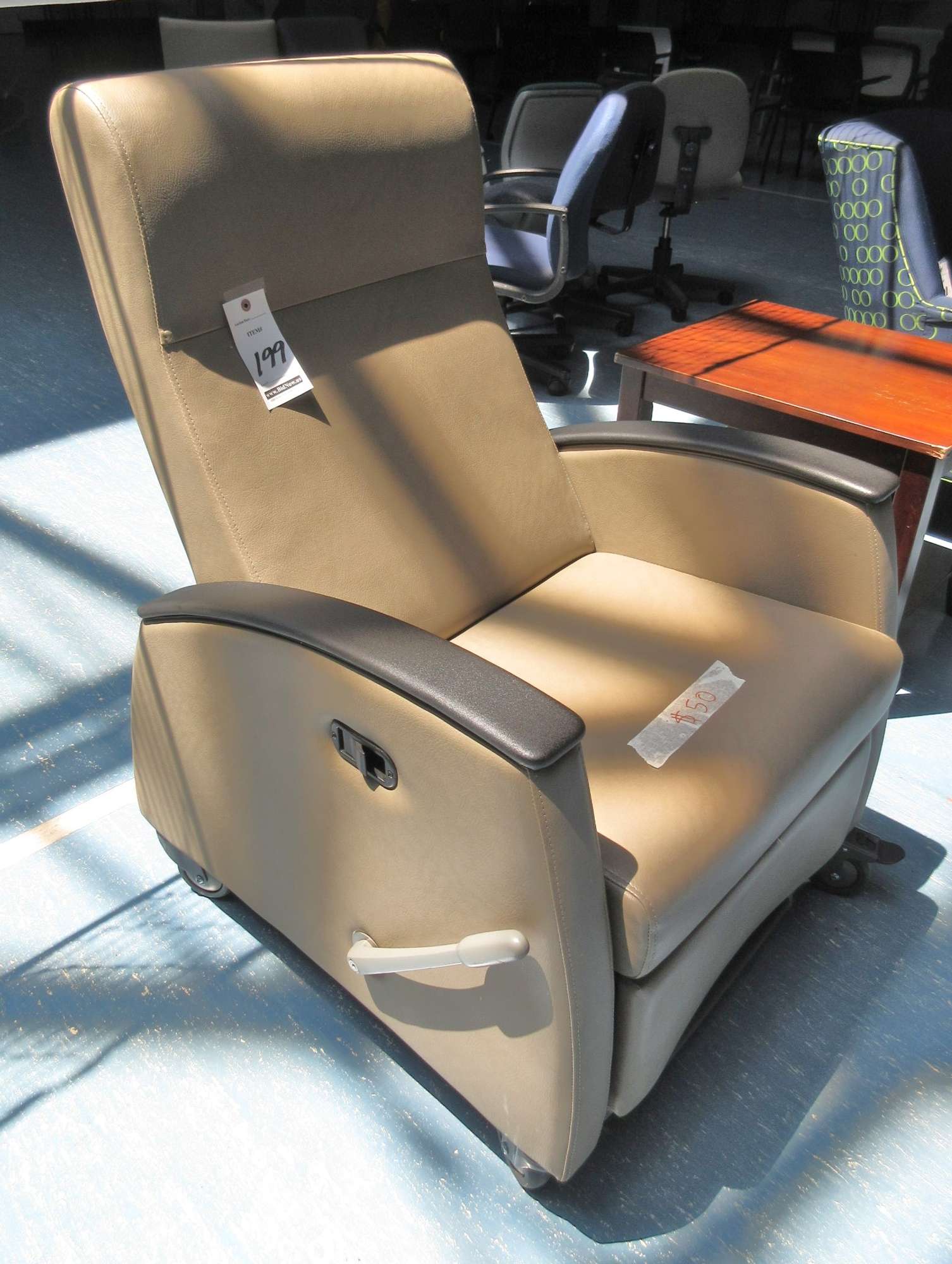 Albrecht Auctions | Rolling Leather Recliner Chair