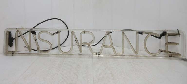 Older Neon Light Sign says Insurance