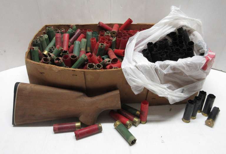 12-Gauge Shotgun Shells for Reloading, and a Wooden Stock