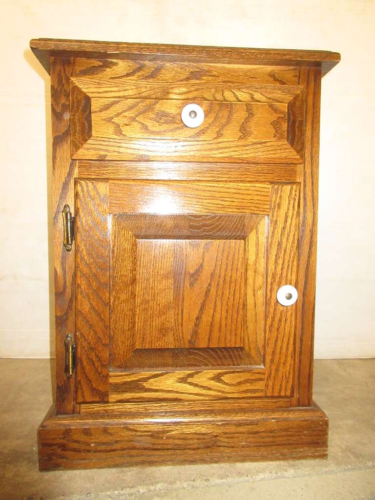 Wooden End Table with a Drawer and Cabinet, Has White Knobs