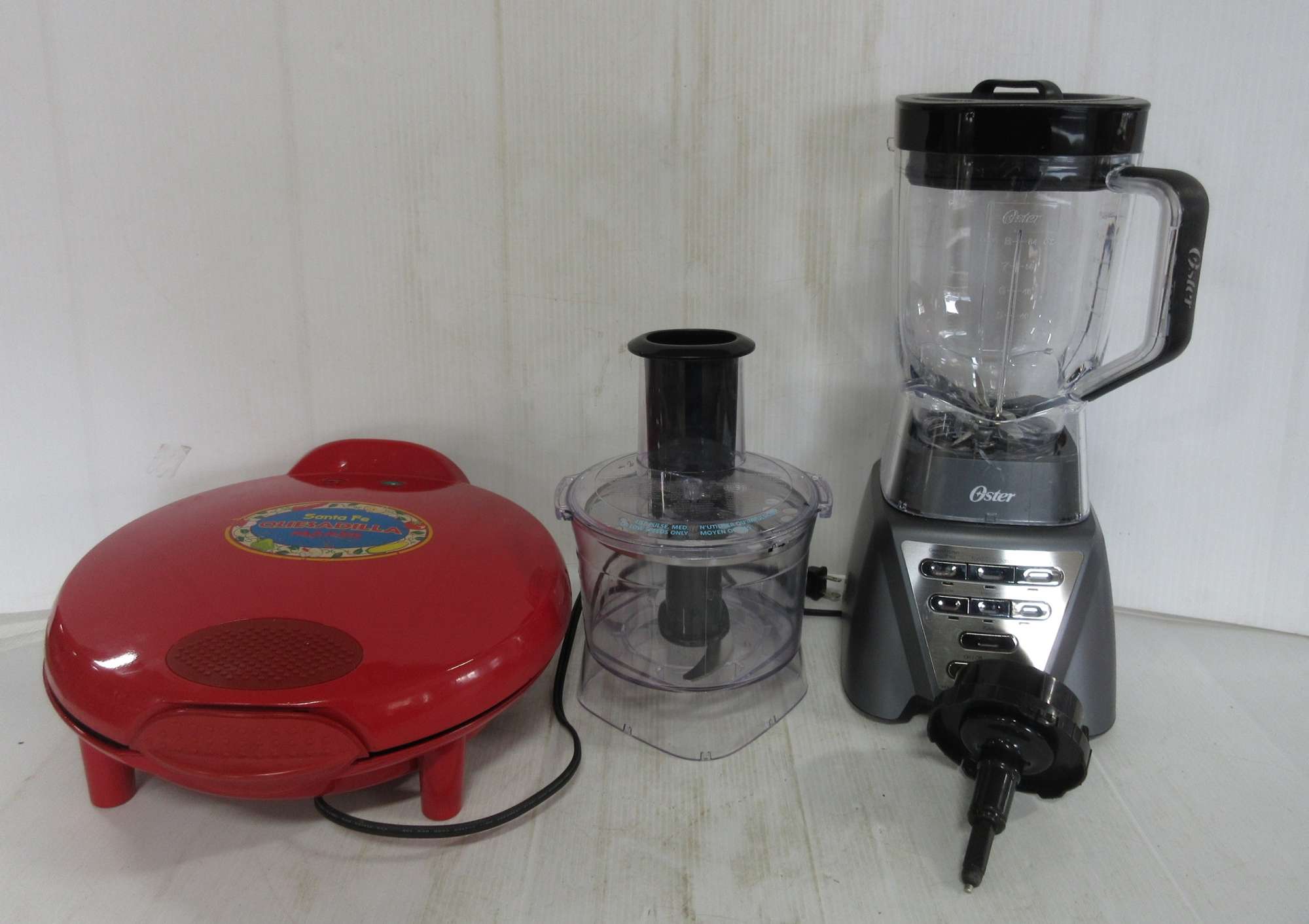 Albrecht Auctions Oster food Chopper, Blender, and quesadilla Maker