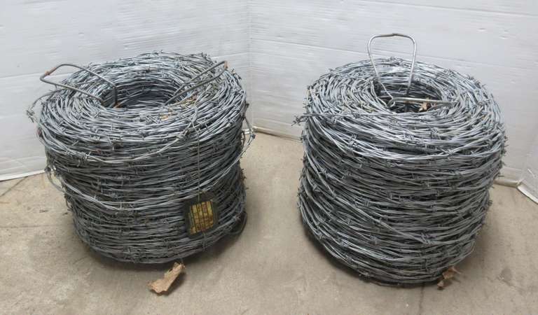 (2) Spools of barbed wire, both full, unused