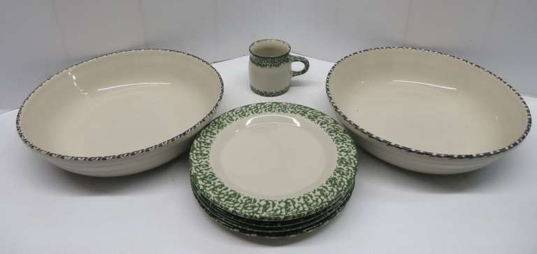 Seven pieces of Roseville spongeware, including: 2- large bowls, 13 1/4"Dia x 3 1/4"D; 4- dishes, 10"Dia; 1- cup, 3 1/2"Dia x 3 3/4"H, no chips or cracks