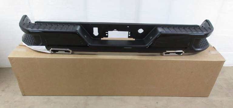 Chevy/GMC 1500 rear bumper, fits 2019 to current models, black metallic, park assist sensors, chrome exhaust tips, side blind zone sensors, includes all brackets and plastic trim, new