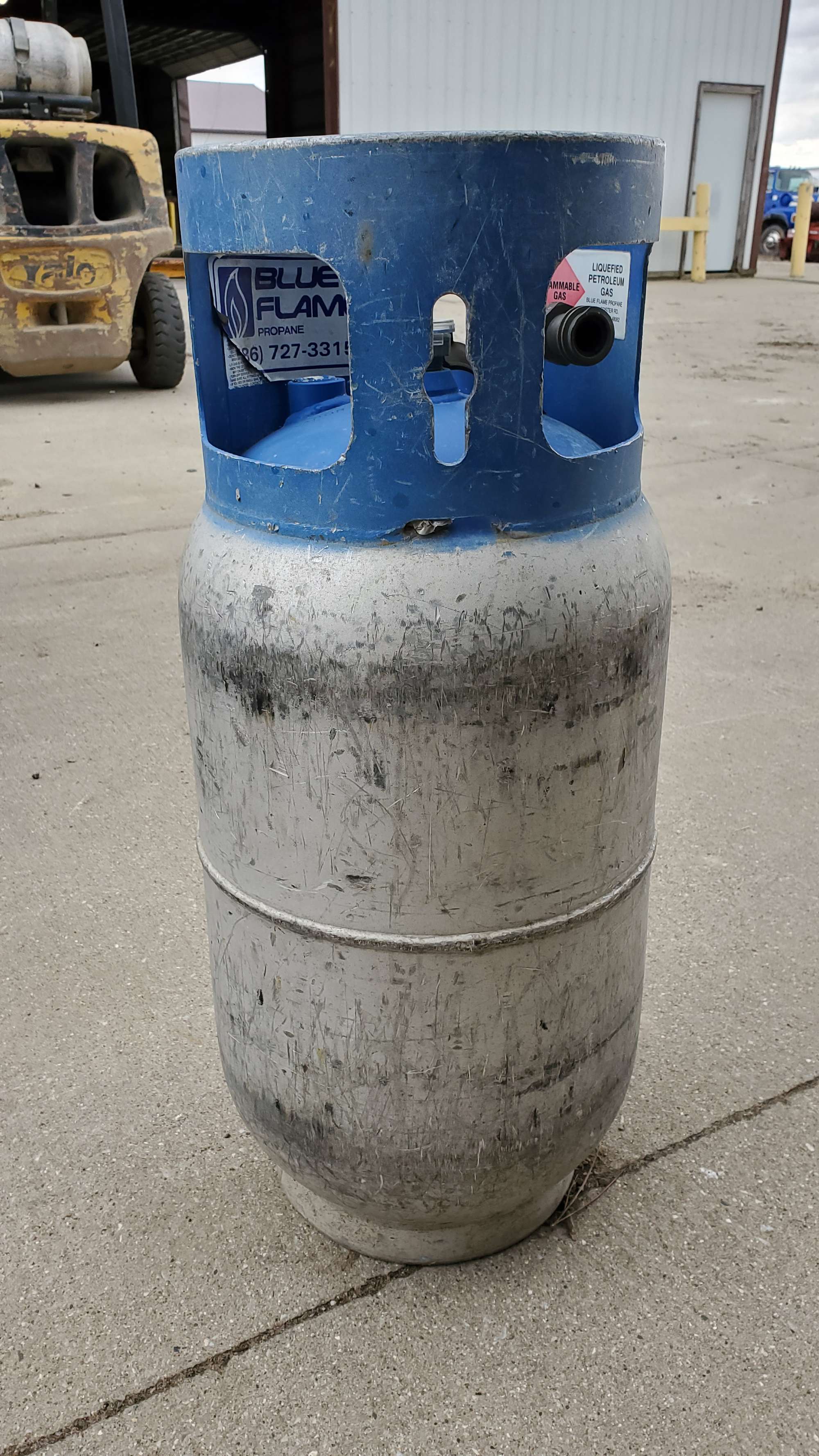 Albrecht Auctions Aluminum Forklift LP Tank, Empty, Ring is a