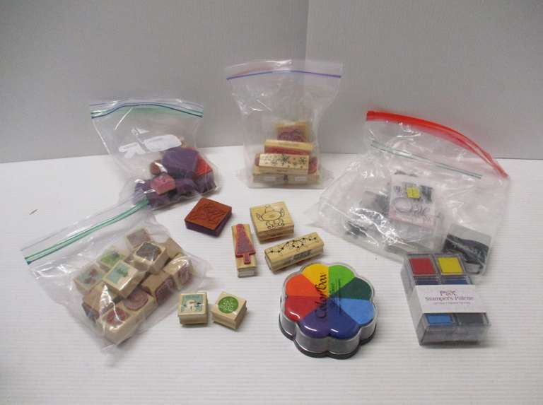 Stamping supplies, include: Wood stamps, ink pads, acrylic stamps and blocks, the ink pads are new, acrylic stamps and blocks are new